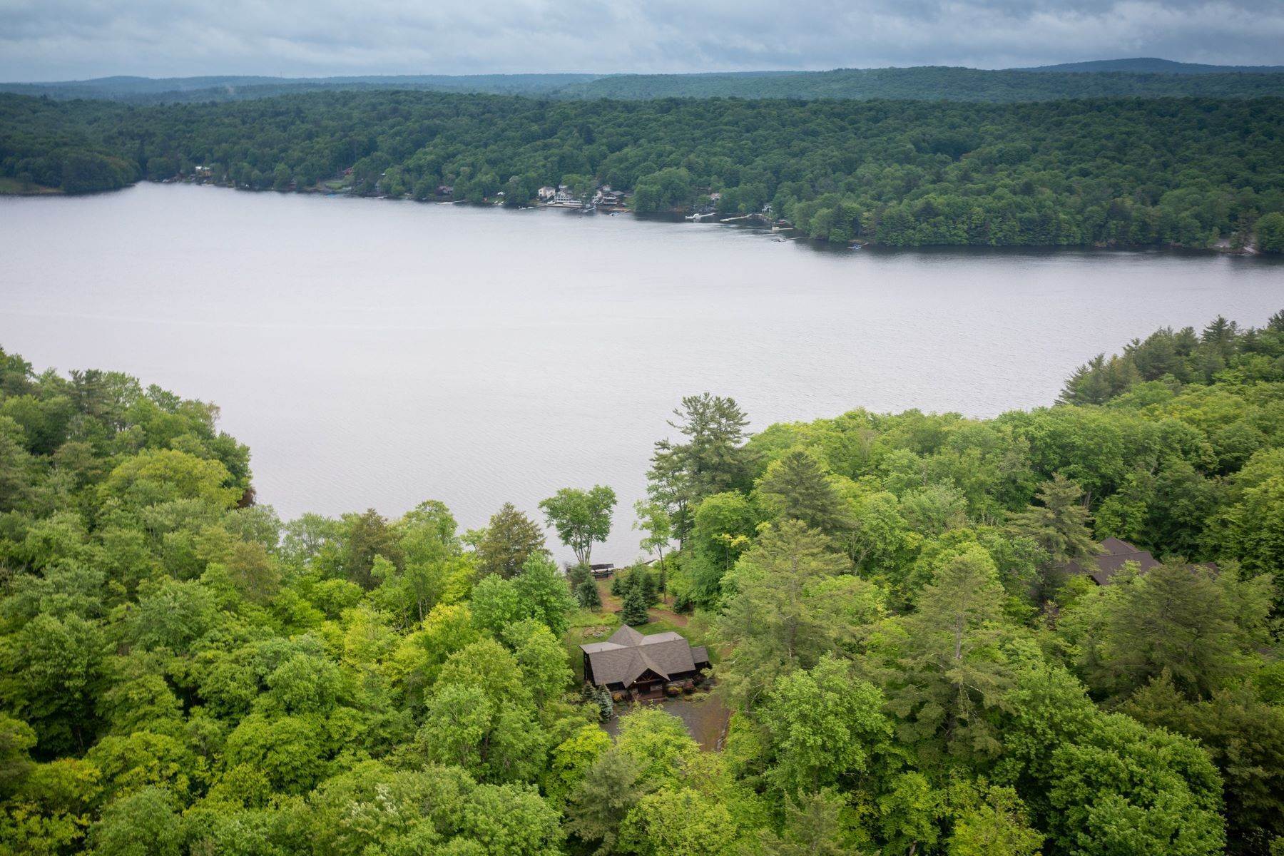 19. Single Family Homes for Sale at The Cabin on Swinging Bridge at The Chapin Estate 367 Woodstone Trail Bethel, New York 12720 United States
