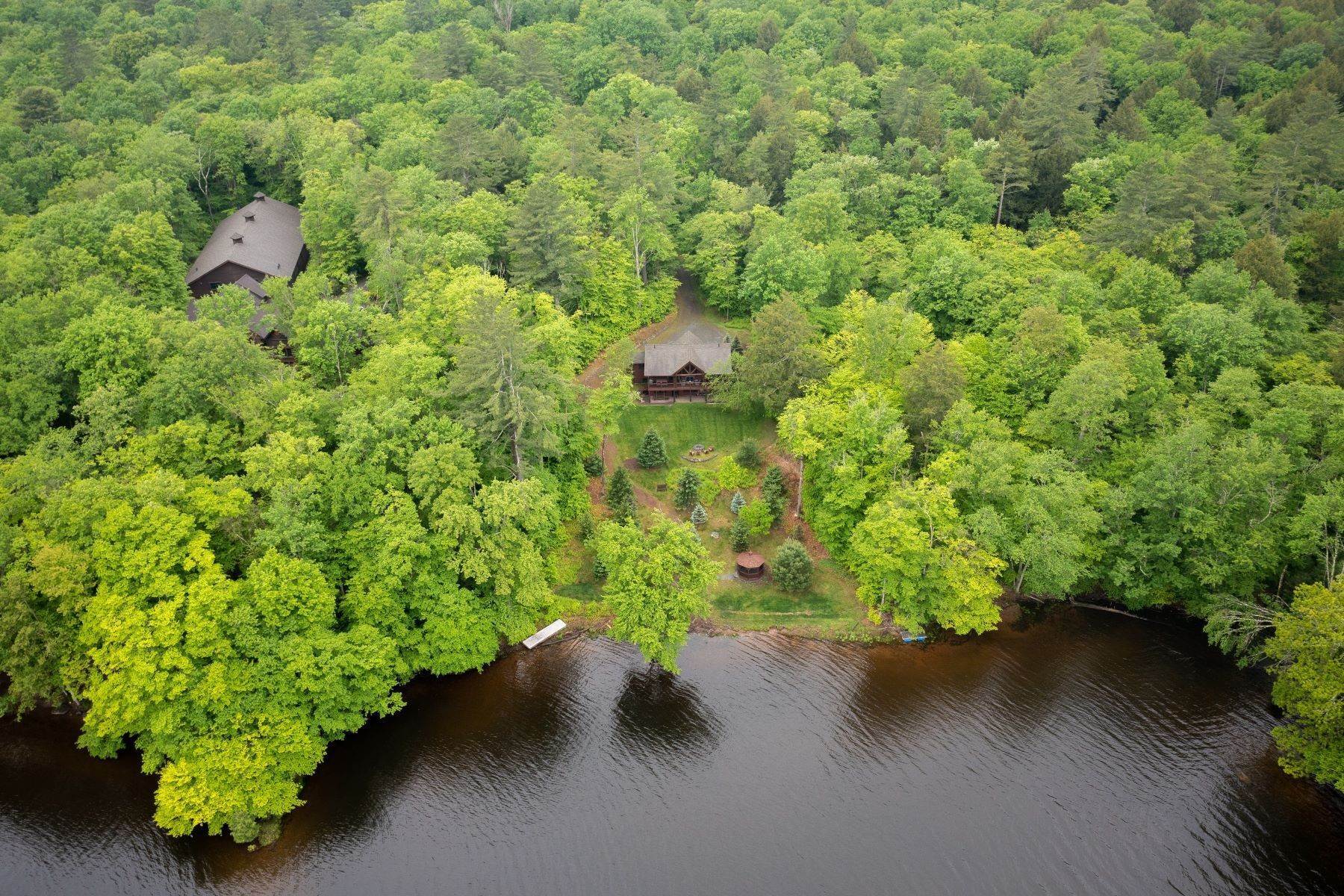 20. Single Family Homes for Sale at The Cabin on Swinging Bridge at The Chapin Estate 367 Woodstone Trail Bethel, New York 12720 United States